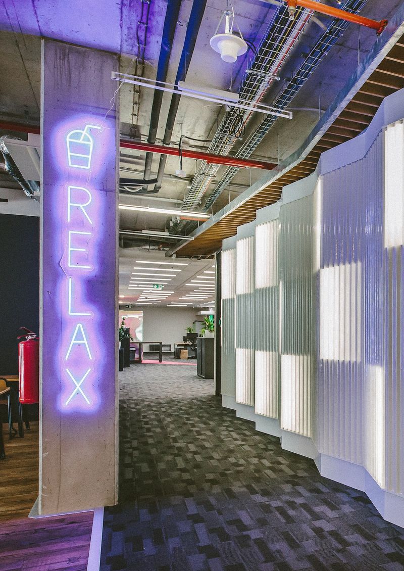 entrance view of the Ackee office with the Relax sign